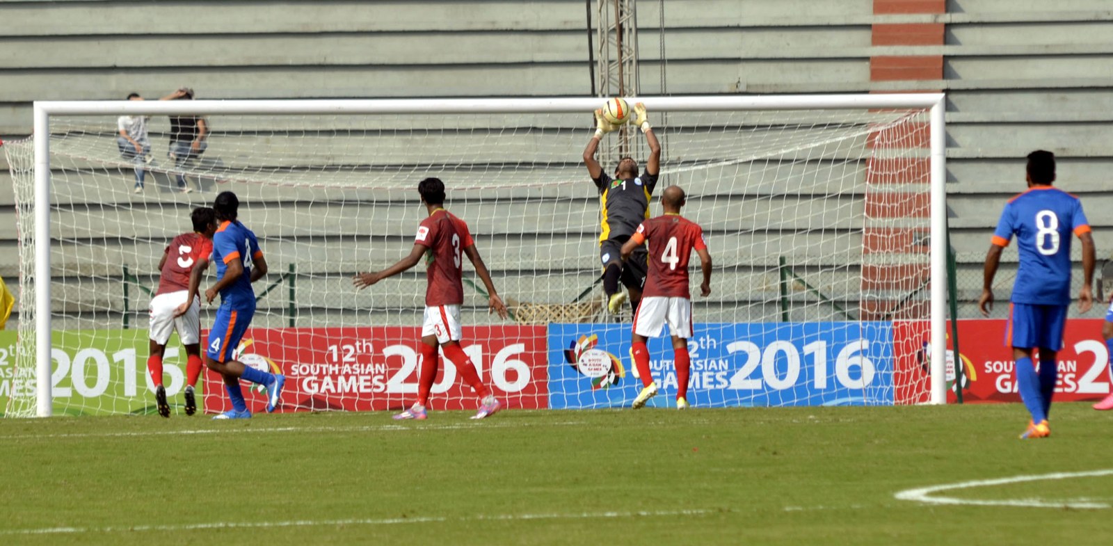 Goalkeeper saving a shot in the India vs Bangladesh football match